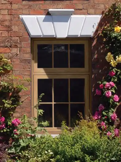 Traditional window surrounded by flowers